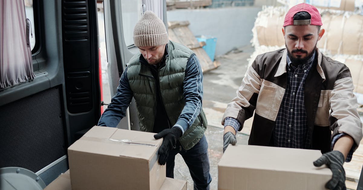 Minecraft Bedrock Chunks not loading - Men Holding Cardboard Boxes