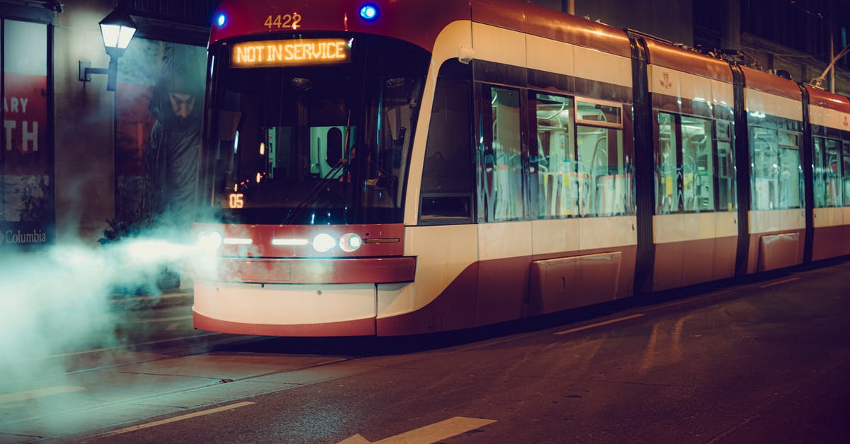 Minecraft Bedrock minecart train - Red and White Tram on Road during Night Time