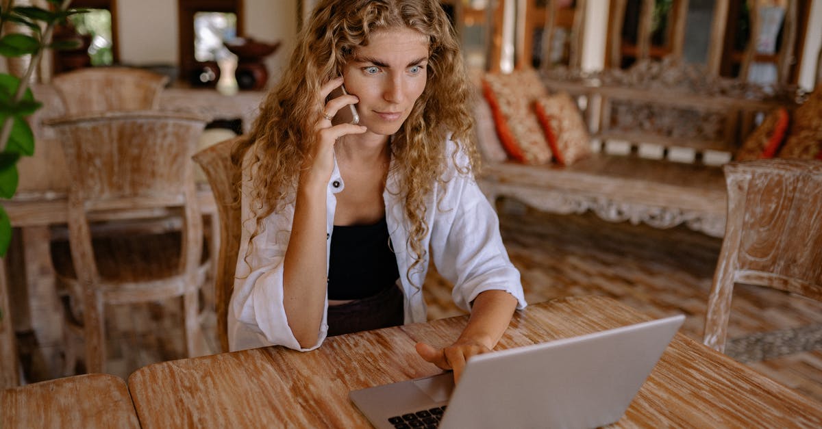 Minecraft server hosting not working on MacOS Big Sur - Photo of Woman Using Smartphone and Silver Laptop