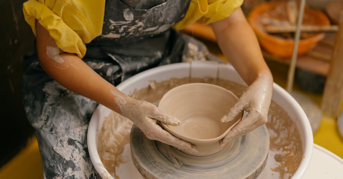 Most effective method of making money? - Person in Yellow Shirt Making Clay Pot