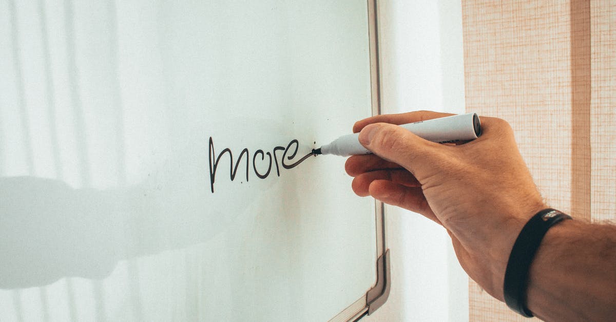 MUCH more Shards needed! - Crop unrecognizable man writing more word with marker on whiteboard during creating new startup in light workplace