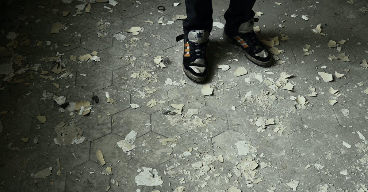 MUCH more Shards needed! - Person Standing on Gray Concrete Pavement Wearing Black-and-gray Lace-up Sneakers