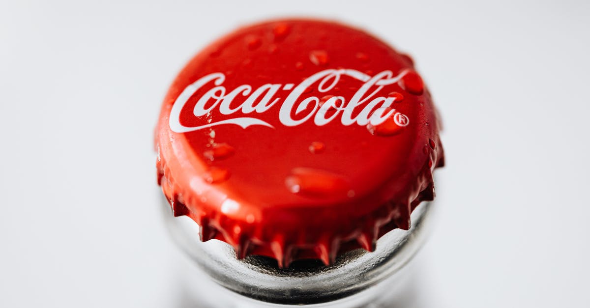 multiple /tellraw reactions from same command [duplicate] - Closeup of red metal bottle cap placed on glass bottle with water droplets on white background