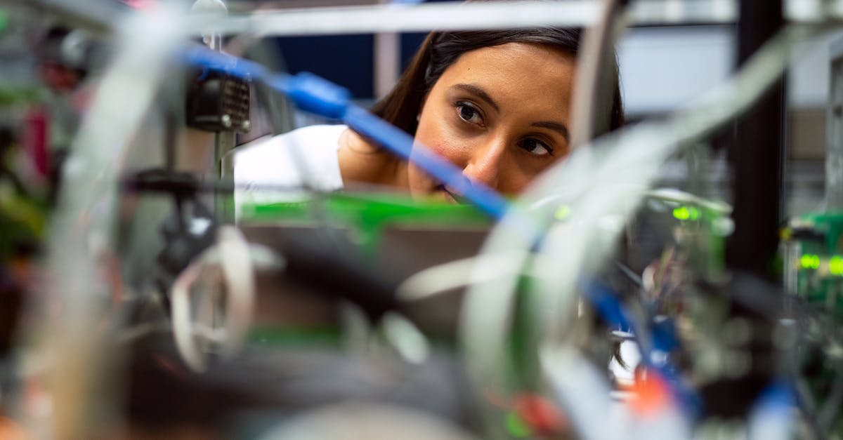 NESBox to VirtualBoy Advance Save File Conversion - Photo Of Female Engineer Looking Through Wires