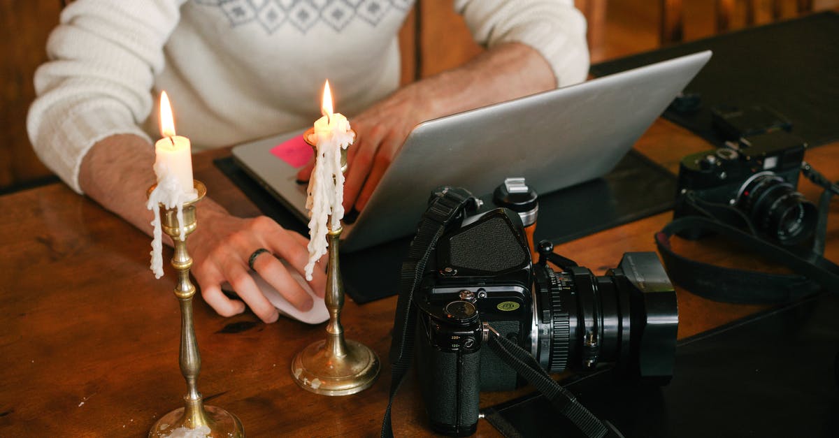 Oculus Quest 2 Cameras not working - Photographer Working on Laptop in Candlelight