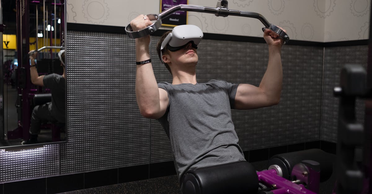 Oculus Quest 2 Cameras not working - A Man Lifting Weights while Wearing Virtual Goggles