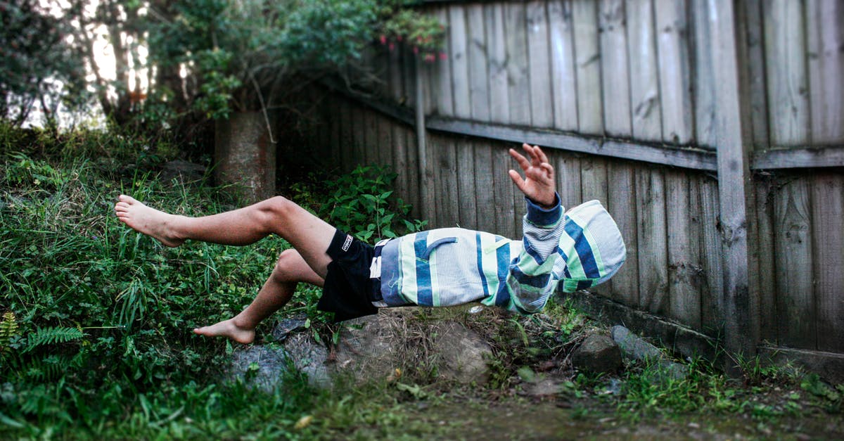 Peach Down Smash Landing All Hits - Floating Photography of Man in White and Blue Striped Top