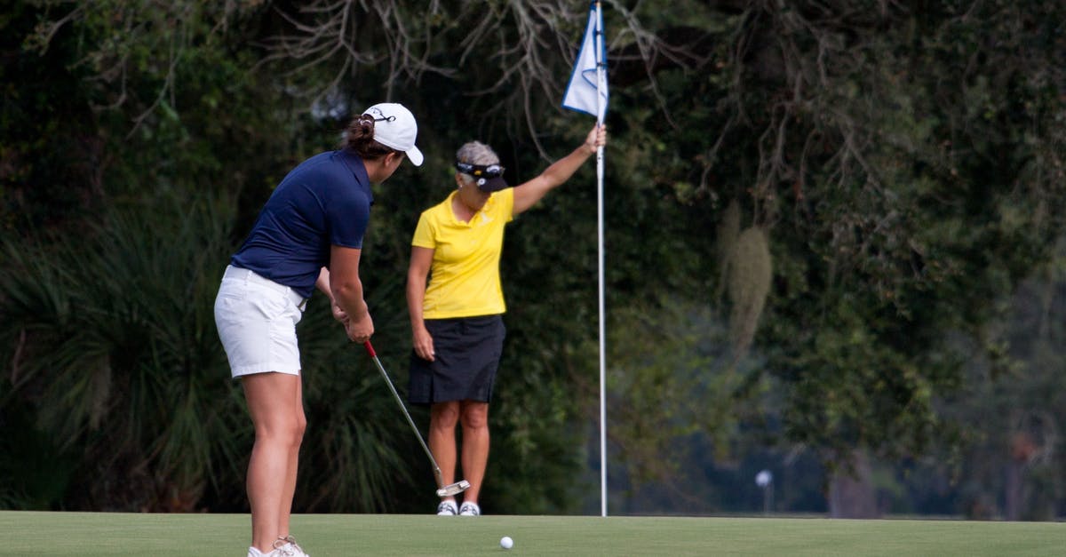 Play a course created by another local user - Two Women Playing Golf