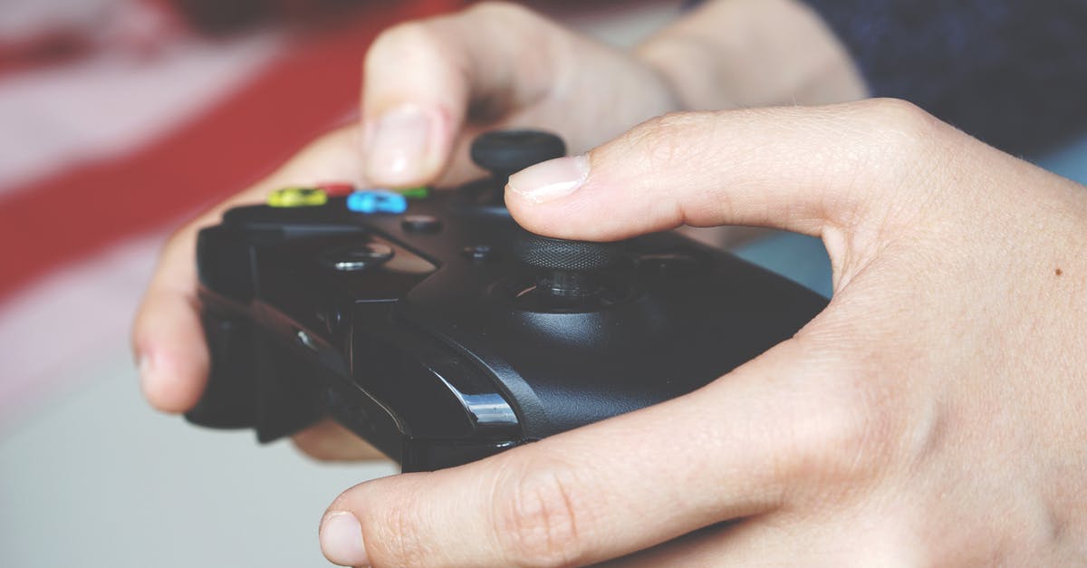 Playing Xbox on a Non-HD TV - Man Holding Black Game Controller