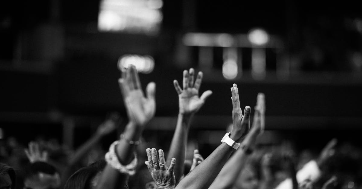 Pointers to closest portals don't show up - Grayscale Photography of People Raising Hands