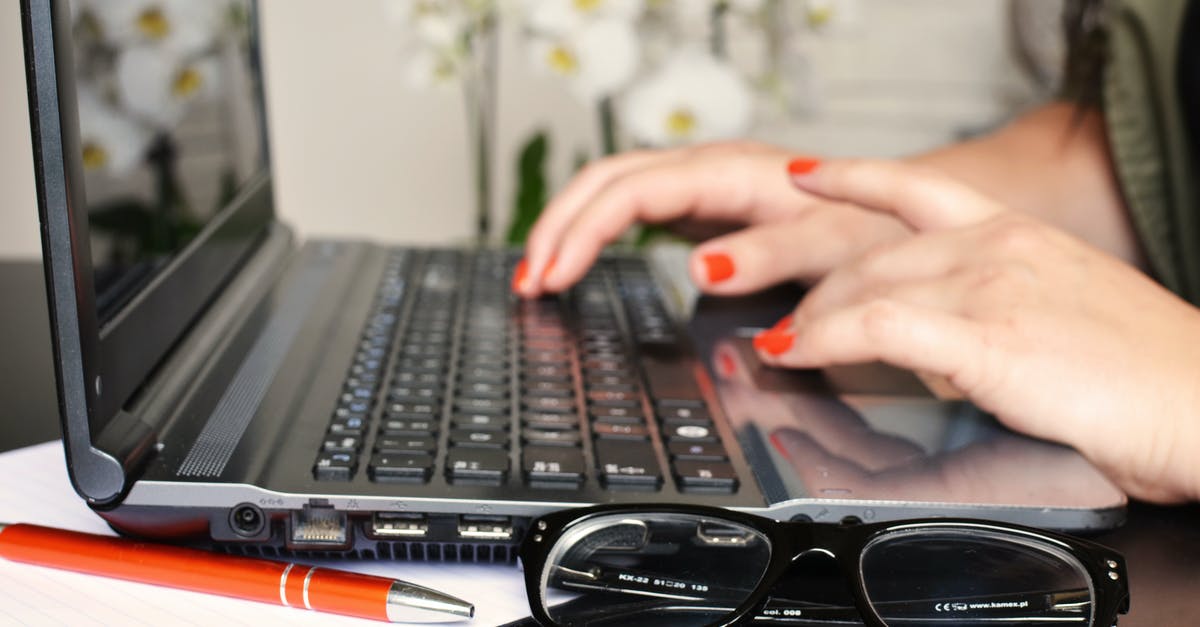 Prince of Persia for PC Windows 7 [closed] - Woman in Front of Laptop Beside White Moth Orchids