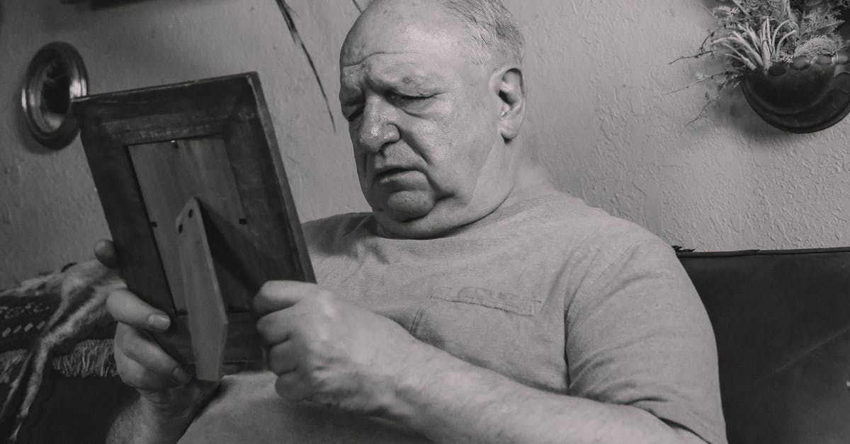 Problems with Multiplayer in Age of Empires II: Definitive Edition - A Grayscale Photo of an Elderly Man Holding a Wooden Frame