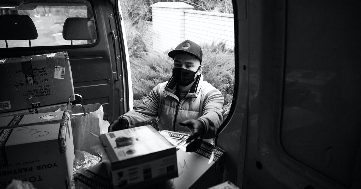 Rebels taking a province at war - A Deliveryman Taking a Package from the Van