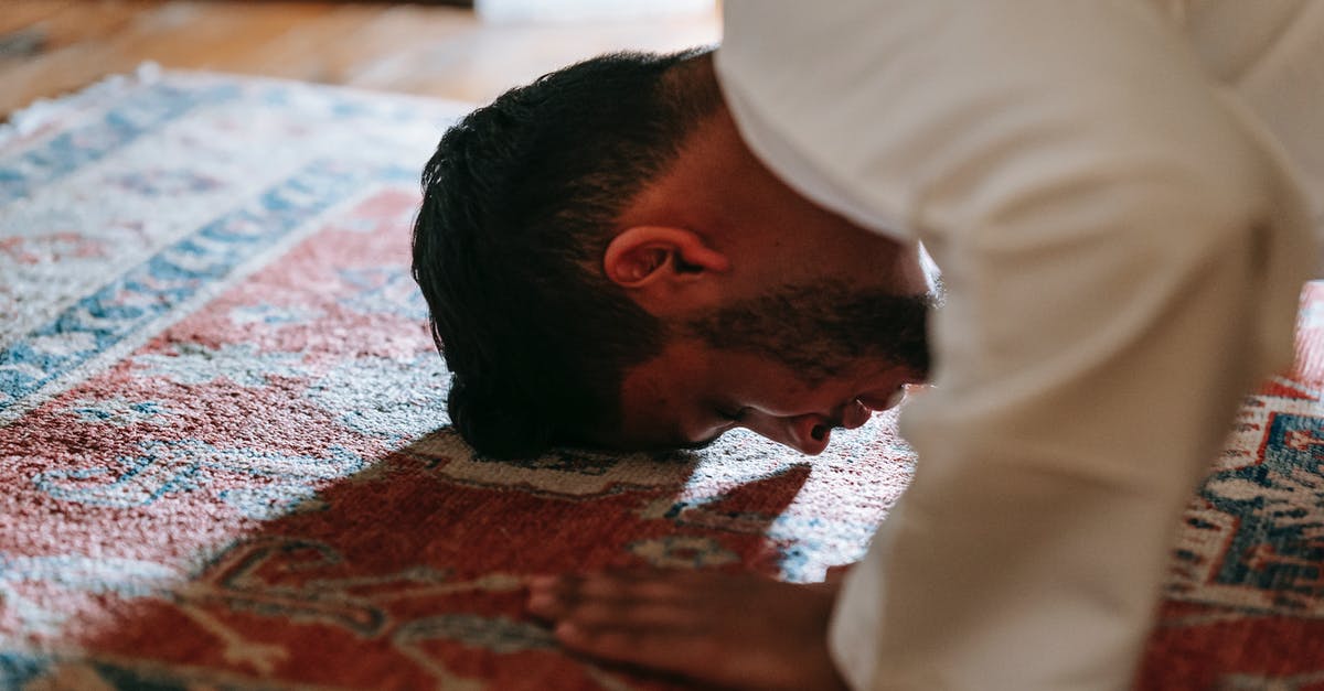 Requirements for Twilight Bow - Man in White Dress Shirt Bowing Down on a Rug