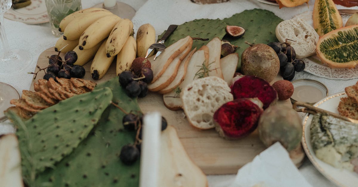 Requirements to beat Necron? - From above of fresh fruit with snacks green opuntia and bread on white cloth for picnic