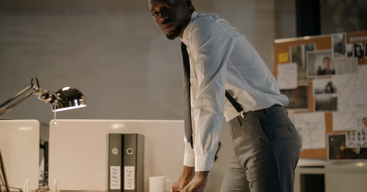 Resuming a suspended Crime Spree costs Continental coins? - Man Wearing White Long Sleeves Standing Near Work Desk