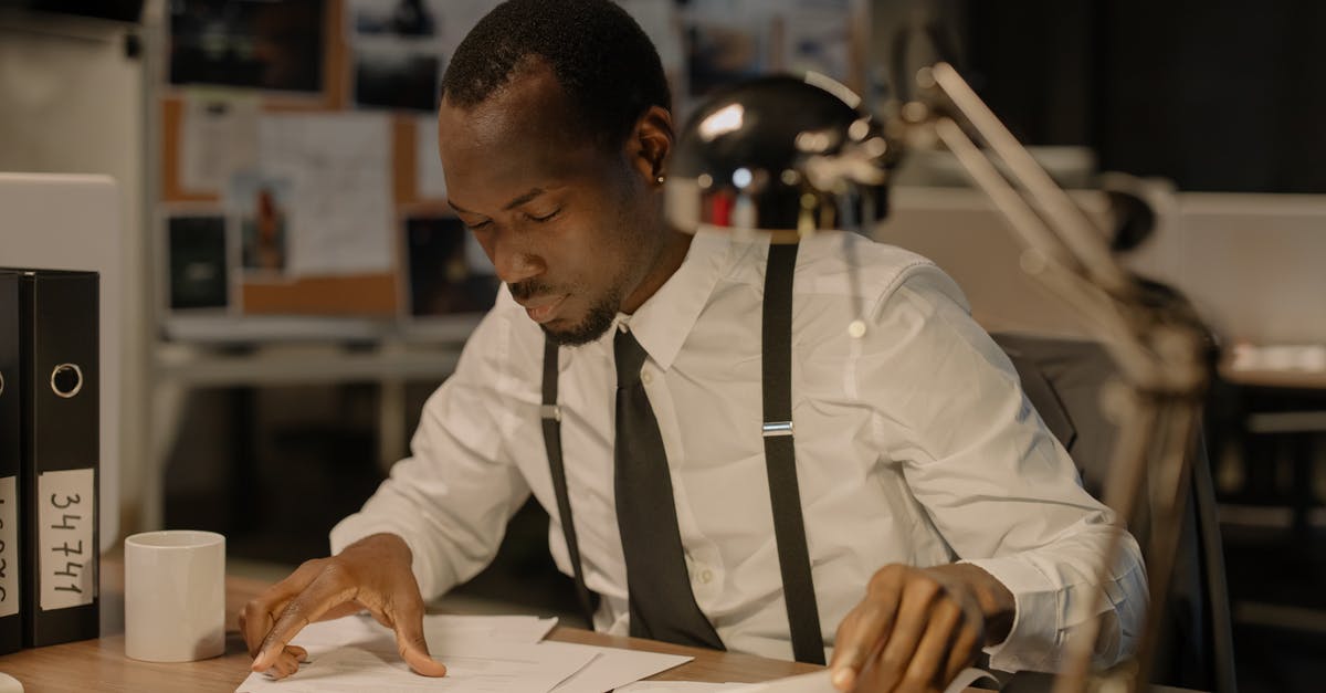 Resuming a suspended Crime Spree costs Continental coins? - Man in White Shirt Looking at the Documents on the Desk