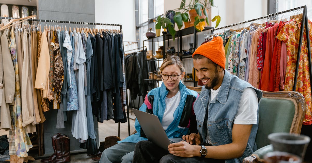 Sell or deconstruct? Which one gets me better gear? - Man and Woman Smiling while Looking at the Laptop 