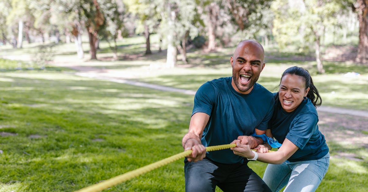 Setting choices without playing the previous games - Man And Woman Pulling A Rope