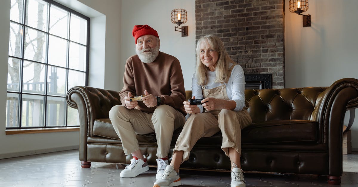 Setting choices without playing the previous games - Man and Woman Sitting on Brown Leather Couch