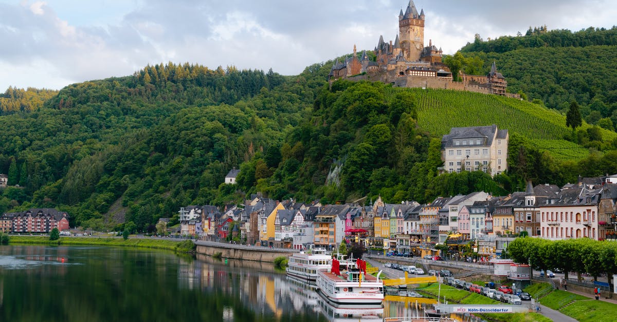 Should I actually build Cloud Castle in Order campaigns? Why? - Castle on Hill over Village Near Body of Water