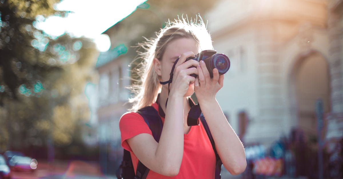 SMAC : how to zoom to/find a city? - Woman in Red Shirt Taking Pictures Using Dslr camera