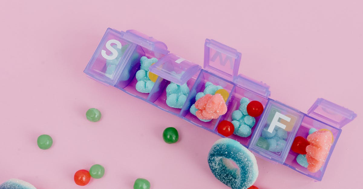 Squad selection in Starcraft - Assorted Color of Candies on Pink Plastic Container