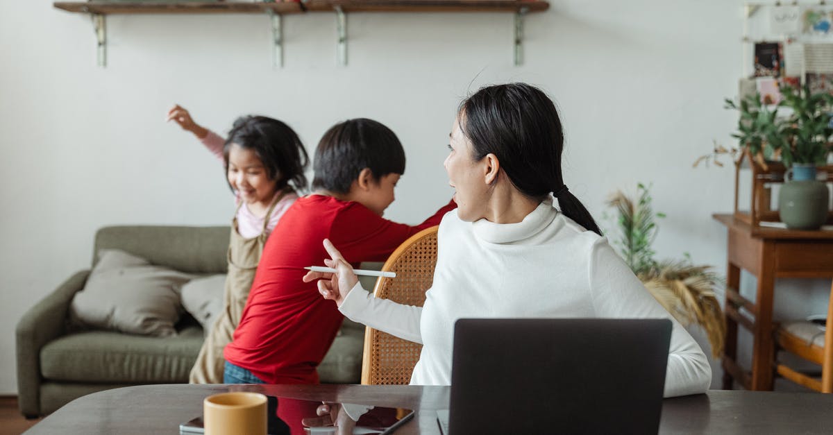 Steam remote play poor quality on linux as a client - Young Asian working mother scolding little kids playing and making noise during remote job at home