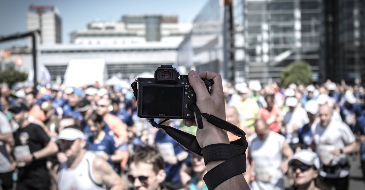 Stop Camera Rotation During Wild Battle - Person Hoding Camera Taking Photo of People