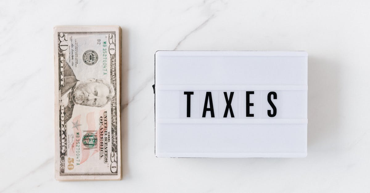 Stop yo weights from inducing chaos due to spinning without struts? - American dollar bills and vintage light box with inscription