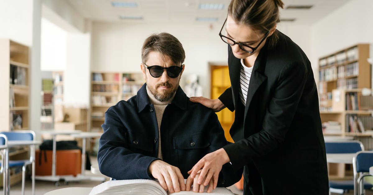 Summoning Written Books and others - Man in Black Jacket Wearing Black Sunglasses with a Woman