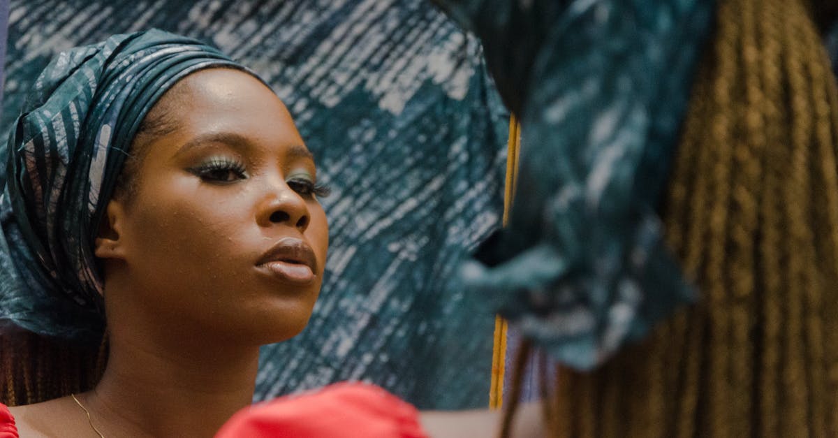 The other name for gunships? - African American Girl in Kerchief and Other Woman with Dreadlocks