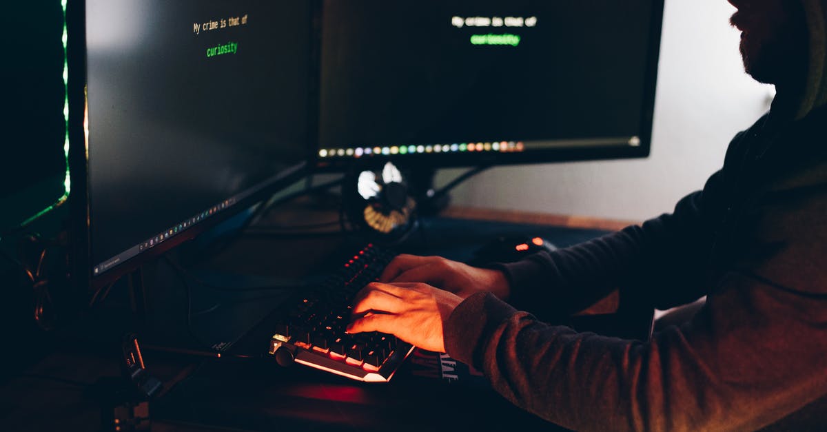 The title command in a execute command - Crop hacker silhouette typing on computer keyboard while hacking system