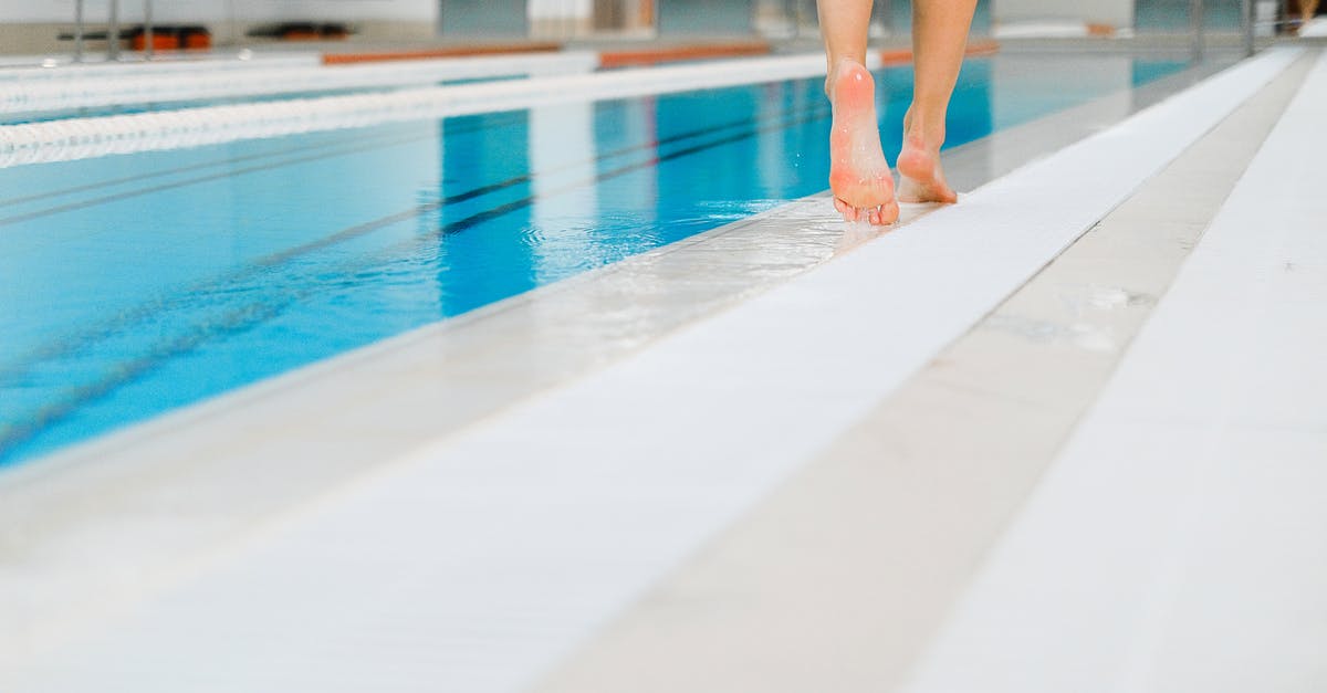 Troops walking out on me - Feet of a Person Walking in the Poolside