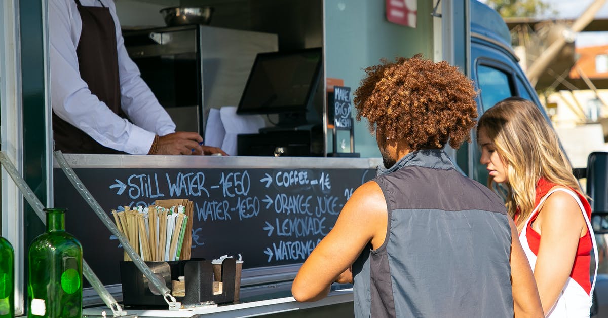 Truck not selecting gears at all in ETS2 after update? - Multiethnic couple standing together near food truck with seller and selecting dishes from menu in sunny day