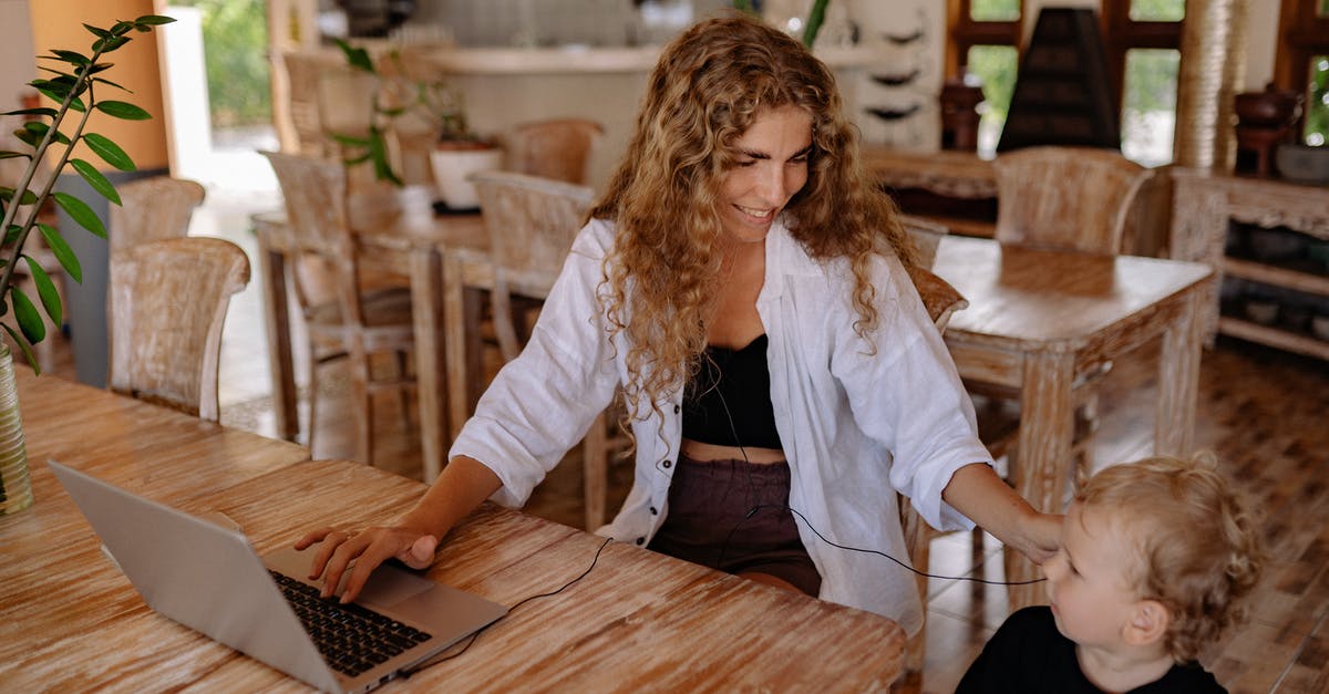 Ulianna Stratagem 6-pc + Madstone interaction - Photo of Woman Smiling While Sitting by the Table With Her Child