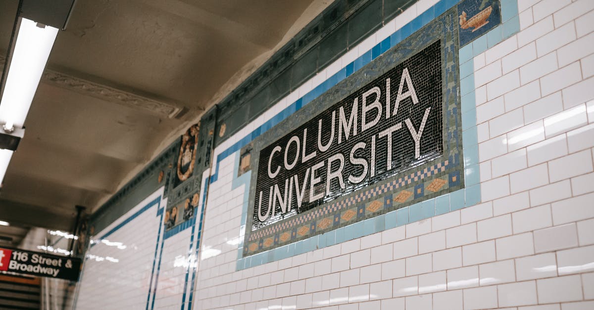 Unable to locate name/value separator - From below of wall with inscription with name of underground station made of tile and mosaic