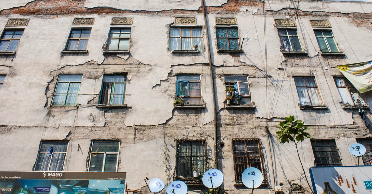 unsummon on damaged buildings? - Facade of an Old Apartment Building