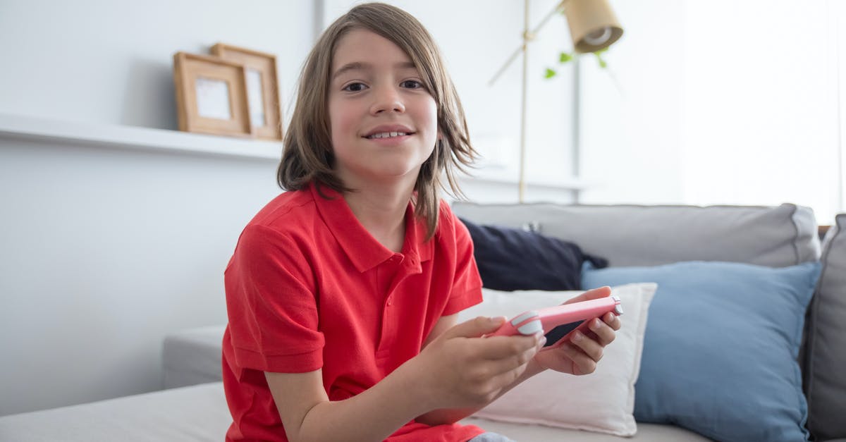 Using Cloud Saved Games for Non-Backwards Compatible games - Boy Wearing Red Shirt Sitting on the Sofa