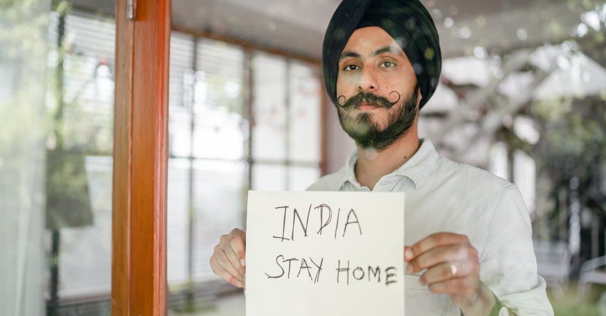 Wall of Flesh battle advice [duplicate] - Bearded modern Sikh with paper in hands behind glass wall