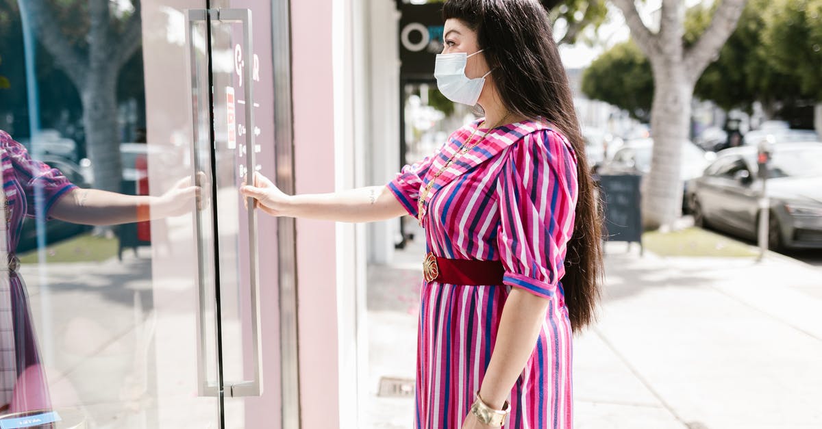 Ways of Entering New Vegas - A Woman in Pink and White Stripe Dress