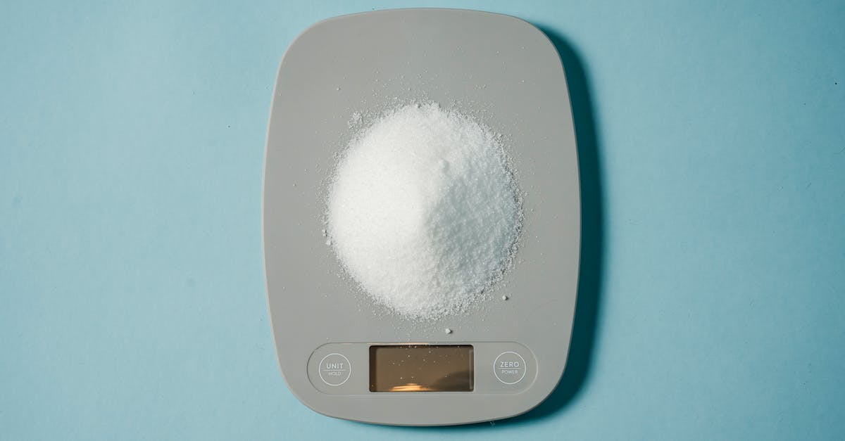 What's the most efficient food source to keep my hunger and thirst levels in check in Survival? - Top view of kitchen scales with electronic display measuring weight of sugar on blue background What's the most efficient food source to keep my hunger and thirst levels in check in Survival? - Top view of kitchen scales with electronic display measuring weight of sugar on blue background