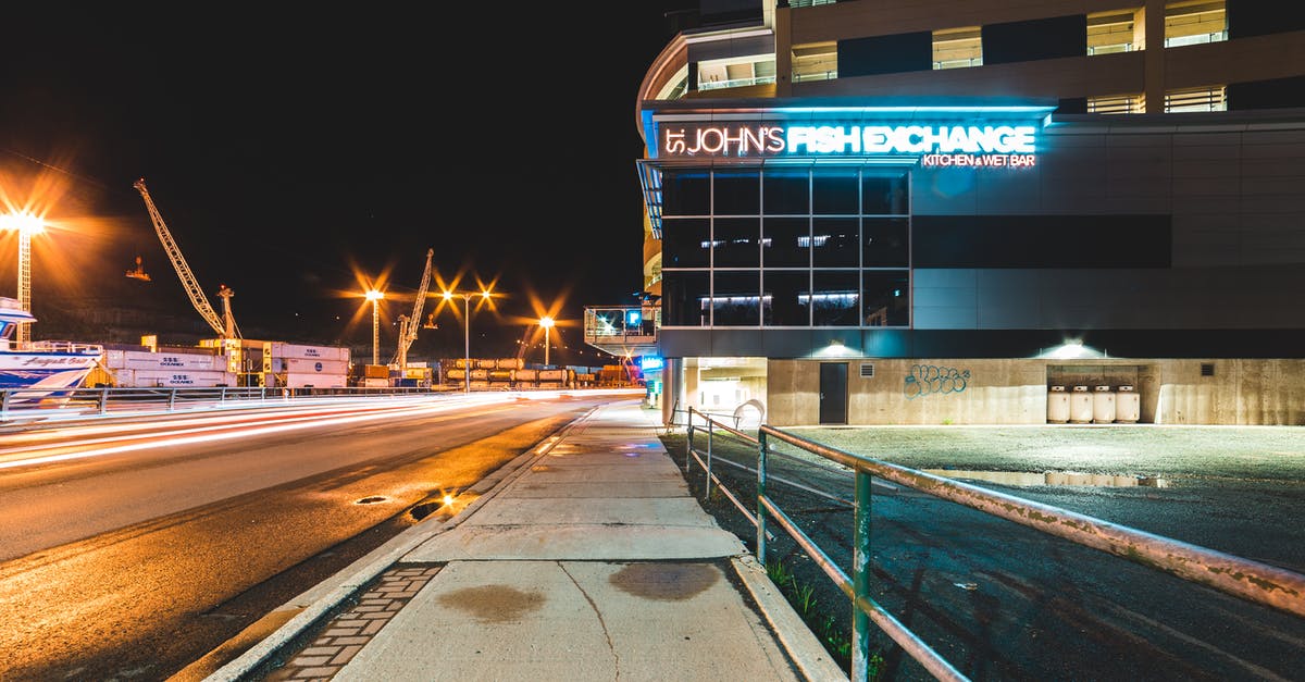 What's the most efficient way to worsen your rank? - Contemporary building on illuminated city street near port at night