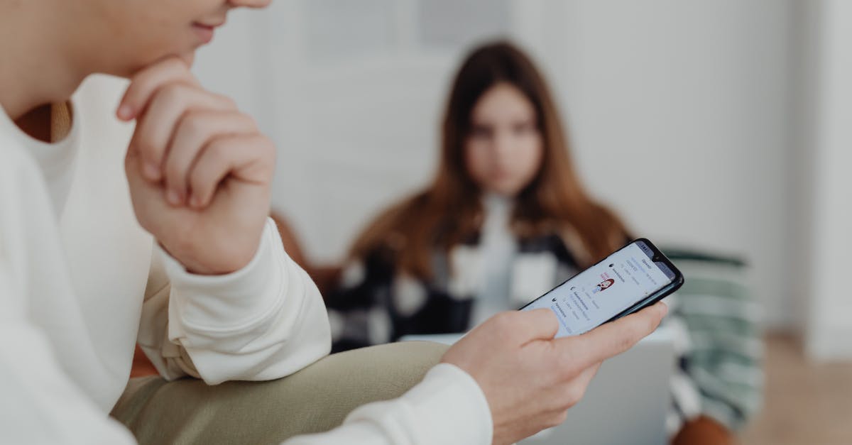 What are the benefits of being social? - Hands of a Boy Using a Smart Phone