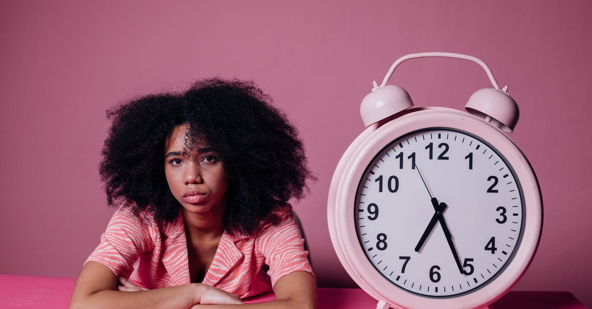 What are the benefits of waiting to drop troops second? - Woman Looking Bored Beside a Big Alarm Clock