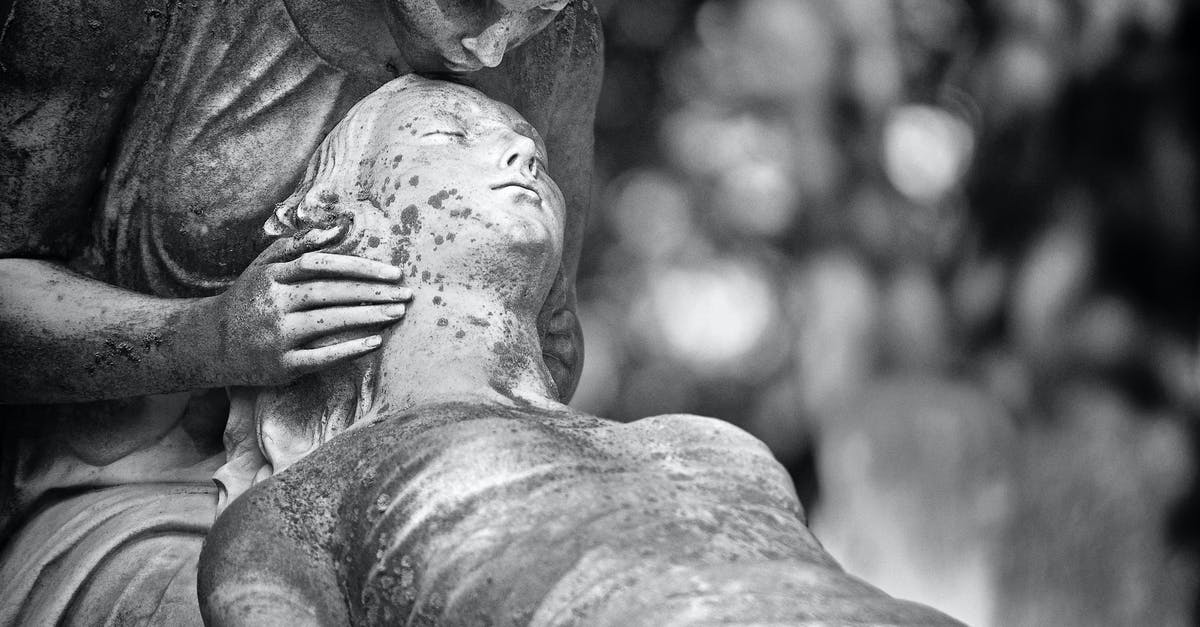 What are the consequences of dying on foot? - Monochrome Photo of Statue