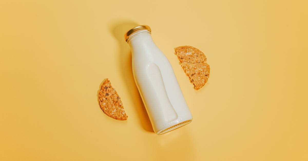 What are the main differences between P4 and P4 Golden? - Bottle of milk with cookies on surface