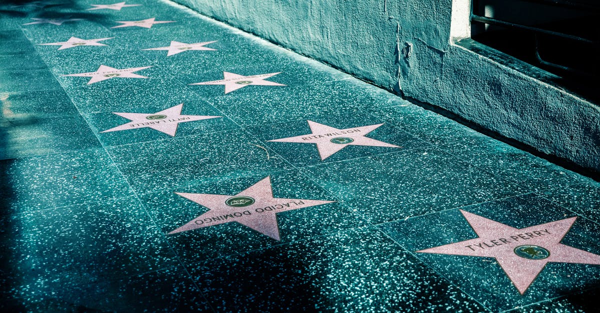 What are the names of all the ships? - Pink Stars on Gray Tiled Street Sidewalk 