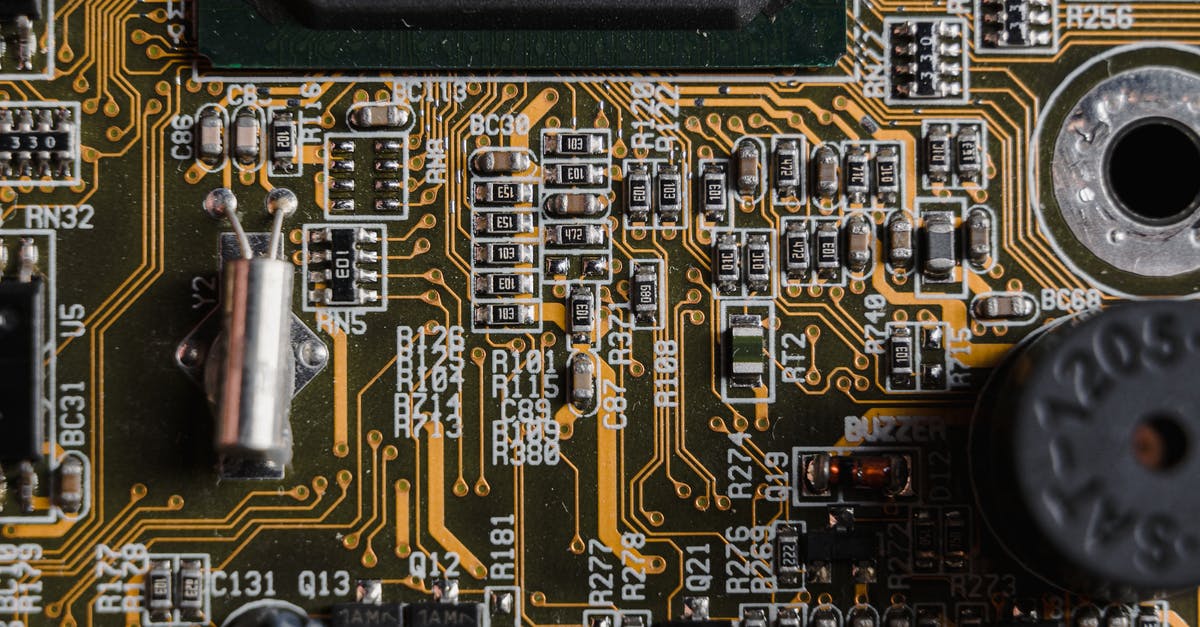 What Atari system does this 1980s PCB go to? - Yellow and Black Computer Motherboard