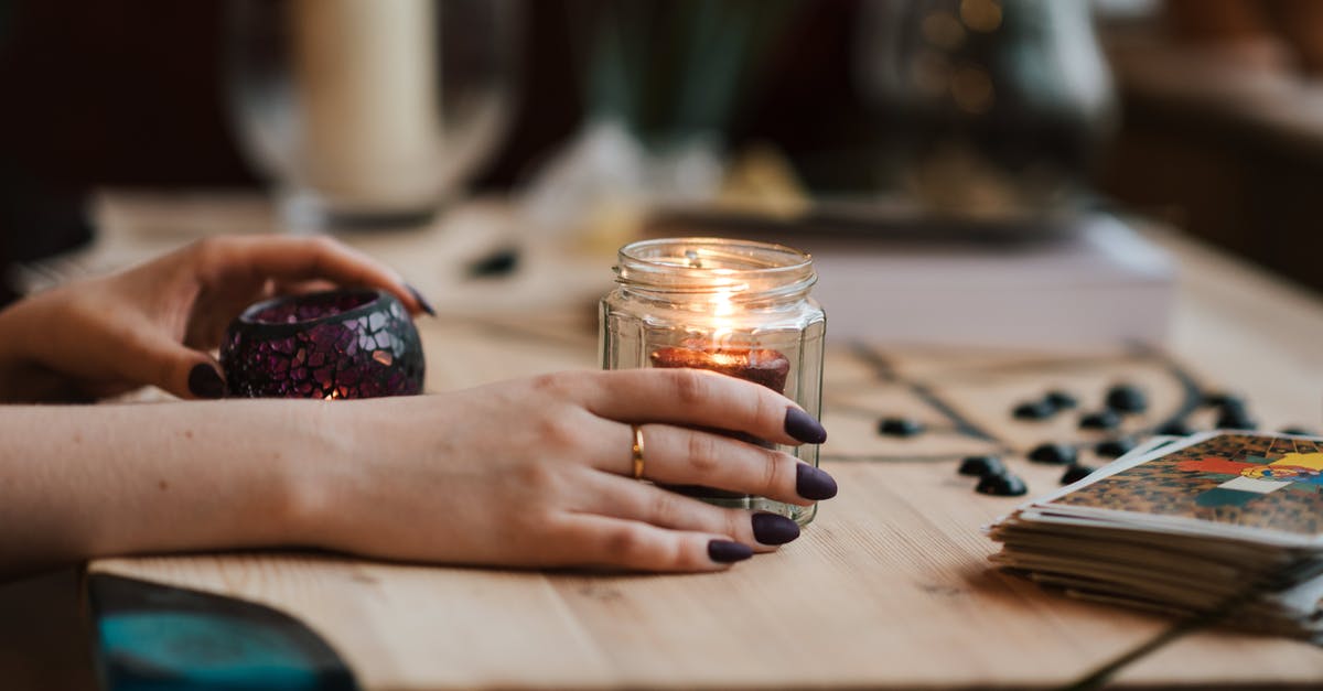 What can I do if I set myself on fire to stop being fire? - Faceless fortune teller with burning candles at home What can I do if I set myself on fire to stop being fire? - Faceless fortune teller with burning candles at home